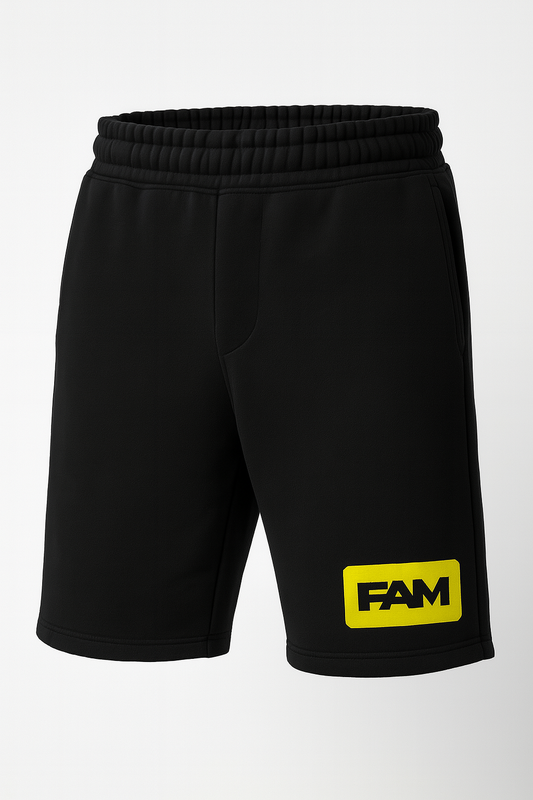 FAM Black Shorts featuring a yellow logo, ideal for gym or casual wear, made from comfy cotton blend fabric.